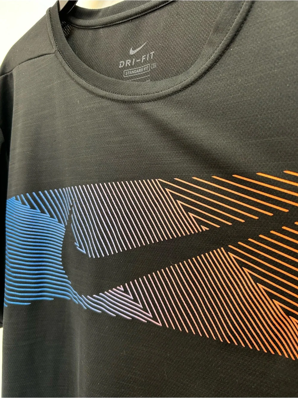Nike Black Short Sleeve Dri-FIT Tee with Blue-to-Orange Gradient Swoosh
